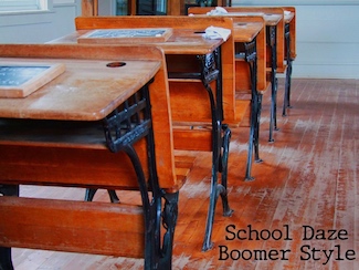 old wooden school desks in an old classroom